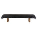 Walnut Crate & Barrel Shuffleboard seen from the side on a white background with the included black protective cover draped over the cabinet and the wood legs visible below