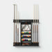 Walnut Crate & Barrel Walnut Pool Table with Wall Rack and Accessories wall rack mounted on a pale wall holding six cues, a triangle rack, three shelves of billiard balls, chalk and a brush