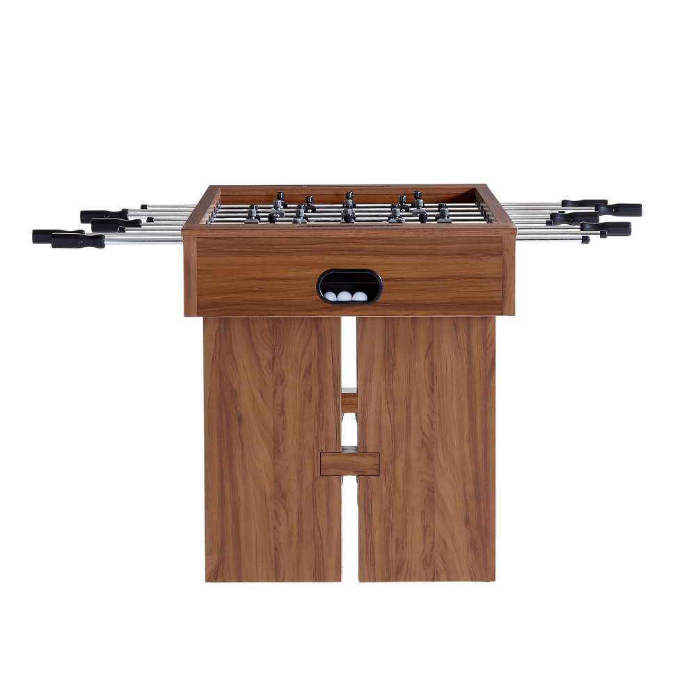 Walnut Wood Crate & Barrel Modern Wood Foosball Table seen from the end with the chrome rods extending out both sides and an oval ball return opening in the end panel