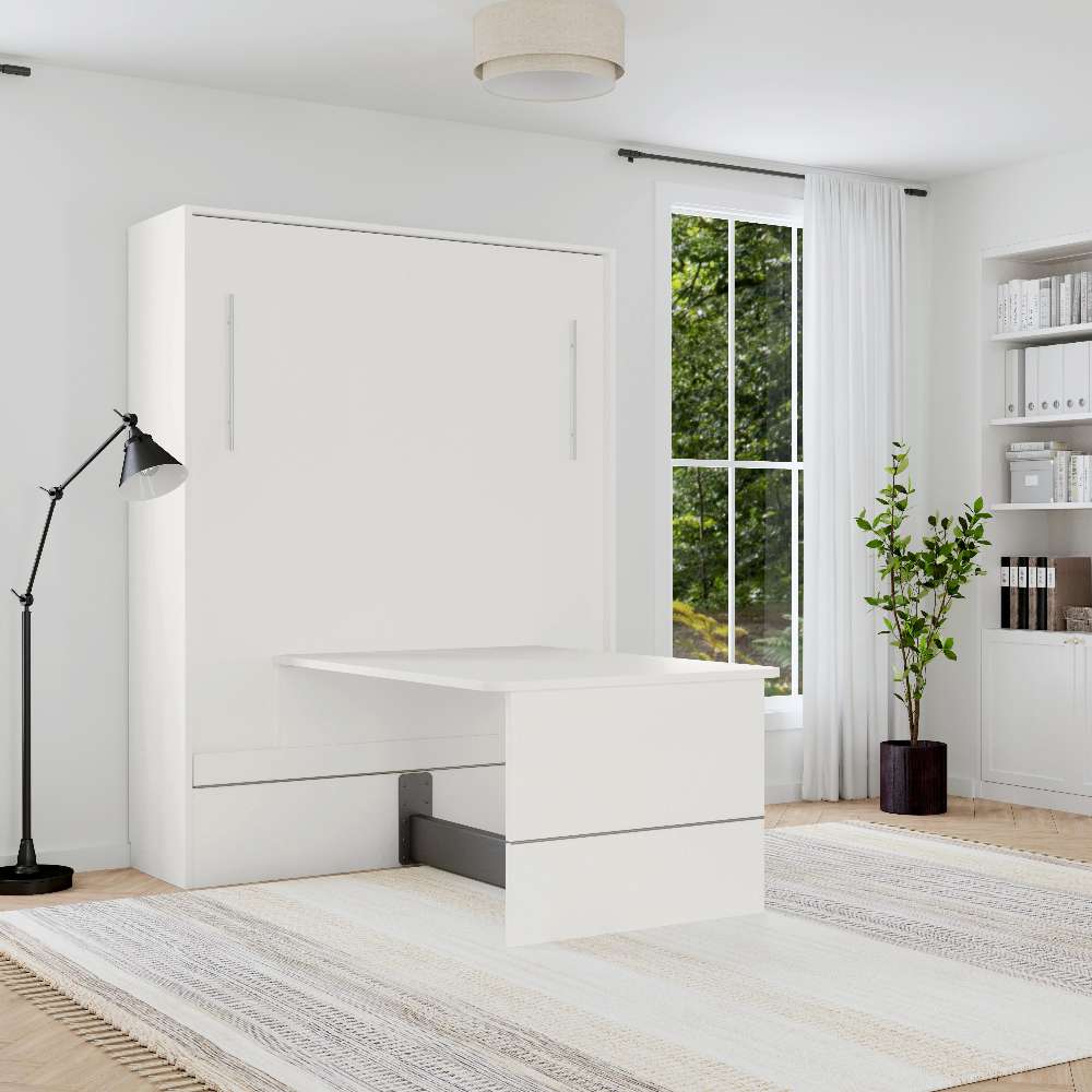 White Inovabed Murphy Bed with Desk closed in a bright room with the table extended into the floor space in front of the cabinet