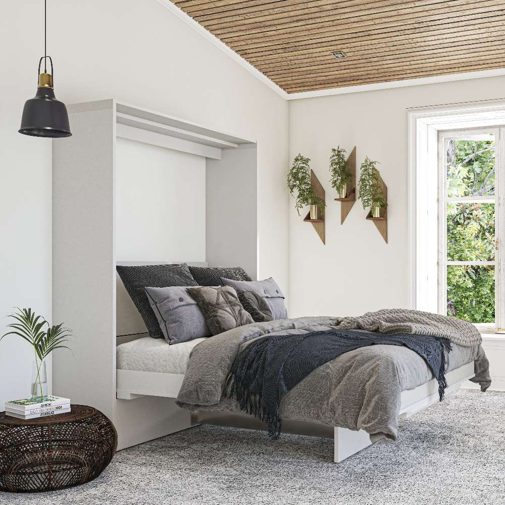 White Inovabed Murphy Bed with Desk opened in a room with a wood plank ceiling, made up with gray and beige bedding beneath three wall-mounted planters