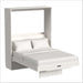 White Inovabed Murphy Bed with Desk photographed at an angle on a white background, opened with two pillows and white bedding over the mattress