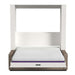 White Inovabed Wall Bed with Extended Sofa head-on studio view with the bed lowered and the bare mattress in place