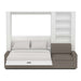 White Inovabed Wall Bed with Extended Sofa head-on studio view with the bed lowered beside the side bookcase
