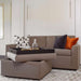 White Inovabed Wall Bed with Extended Sofa photographed room with the unit closed as a sofa, an ottoman with a serving tray and orange and navy pillows