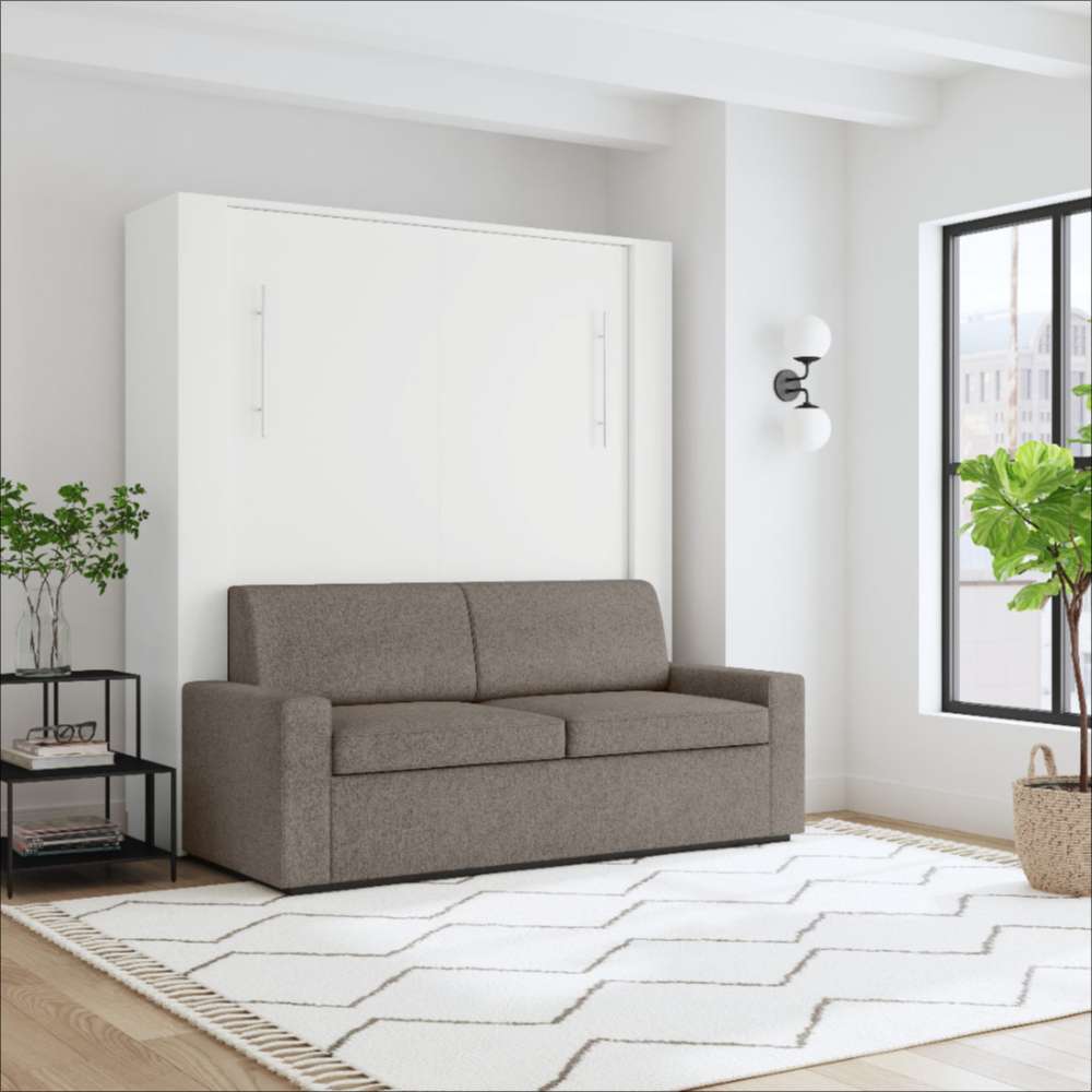 White Inovabed Wall Bed with Sofa and Two Nightstands closed as a gray sofa in a loft-style room with a wall sconce and a tall window