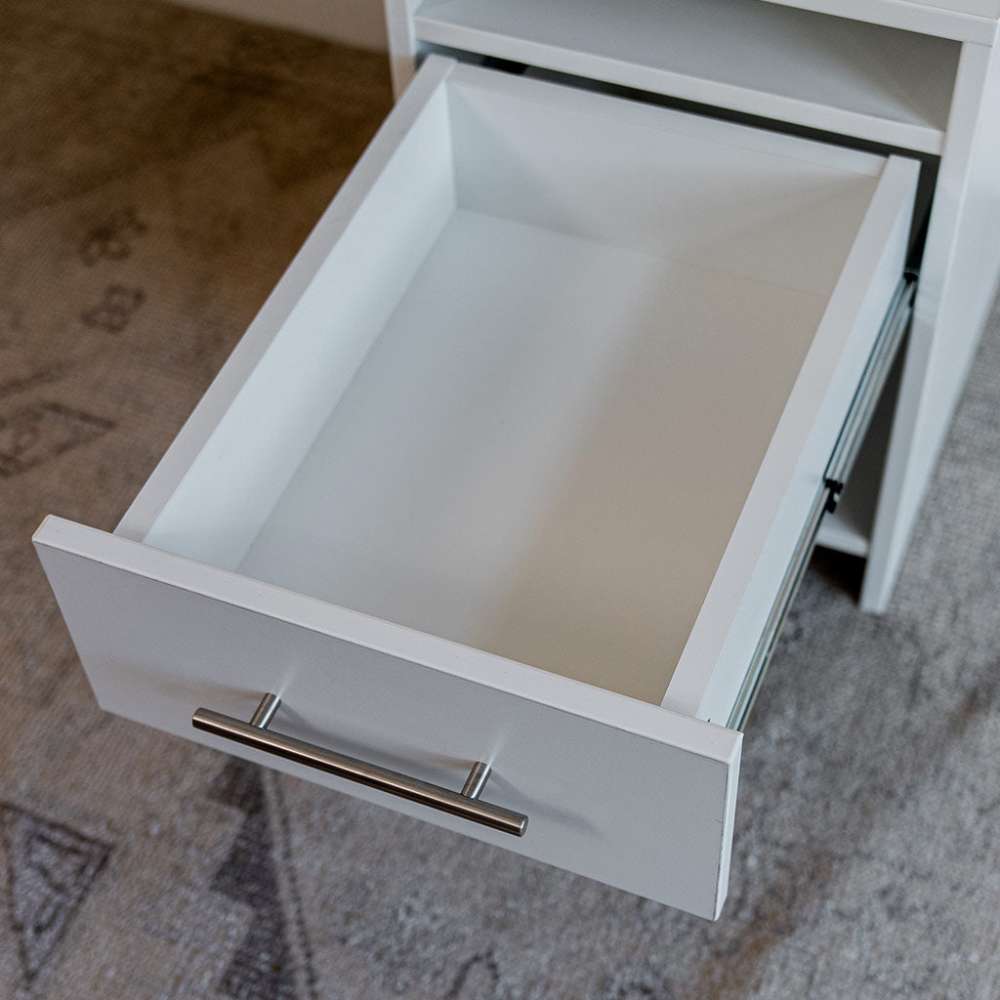 White Inovabed Wall Bed with Sofa and Two Nightstands in close-up with a nightstand drawer pulled open and empty