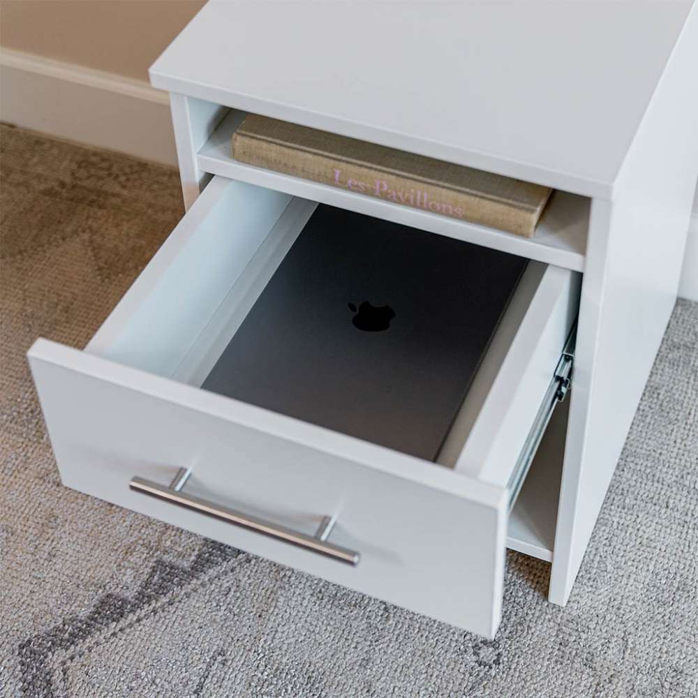 White Inovabed Wall Bed with Sofa and Two Nightstands in close-up with a nightstand drawer pulled open on a laptop stored inside