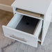 White Inovabed Wall Bed with Sofa and Two Nightstands in close-up with a nightstand drawer pulled open on a laptop stored inside