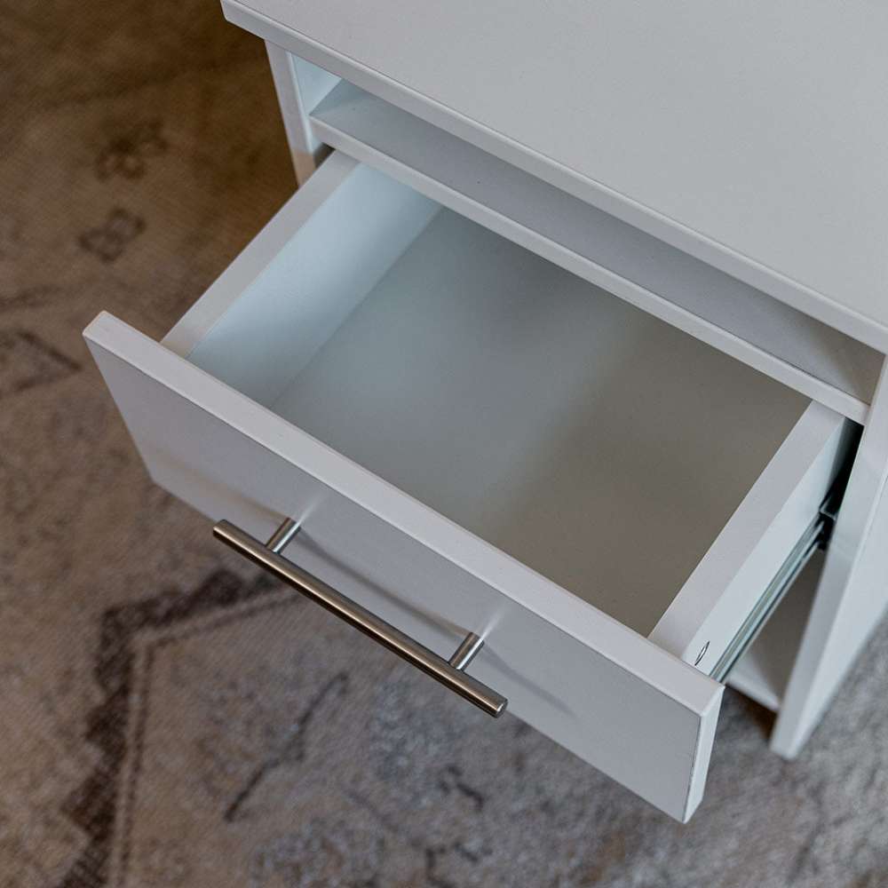 White Inovabed Wall Bed with Sofa and Two Nightstands in close-up with a nightstand drawer pulled open, showing the empty interior and full-extension slide