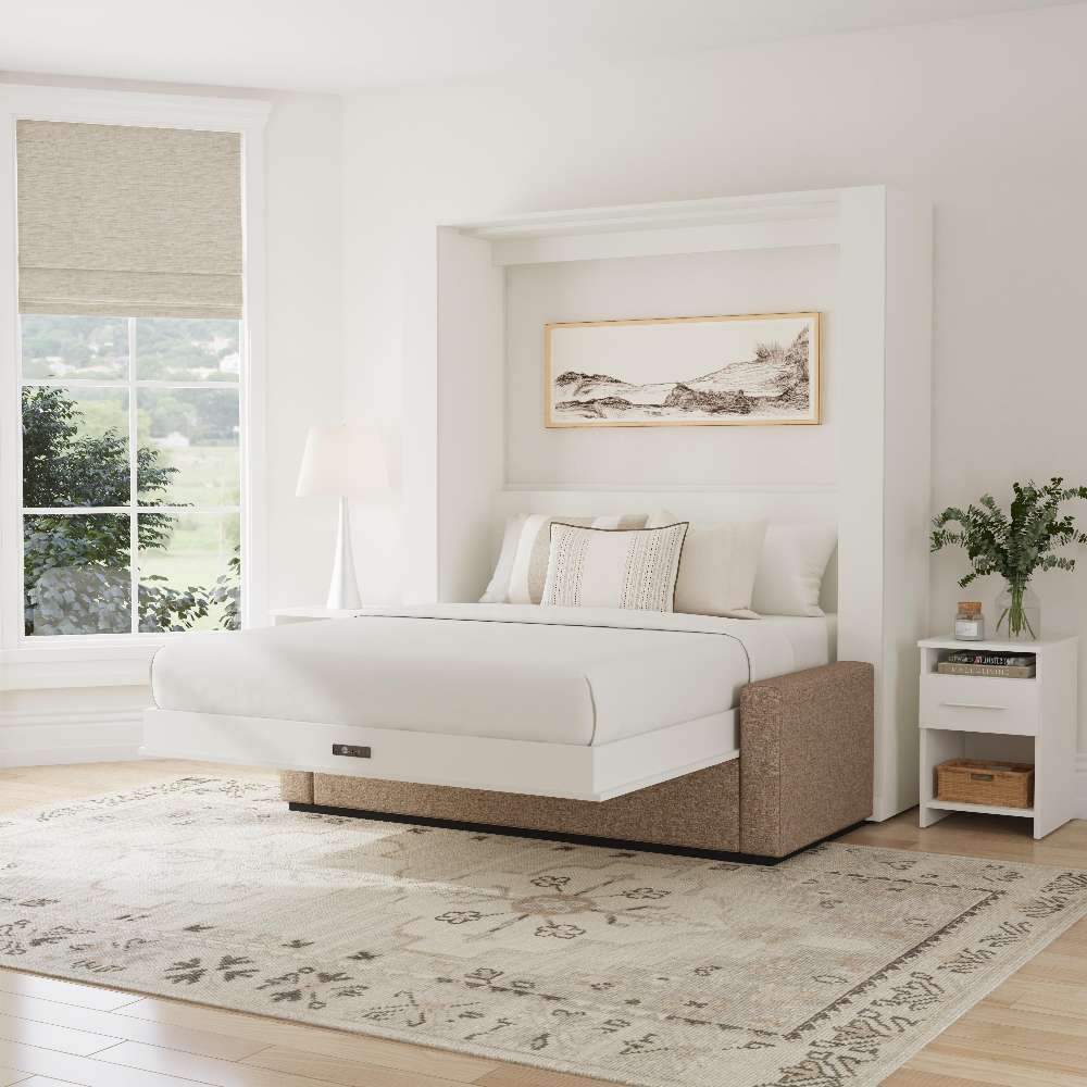 White Inovabed Wall Bed with Sofa and Two Nightstands opened in a bright room with a nightstand alongside, white bedding and a framed landscape print above the headboard