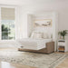White Inovabed Wall Bed with Sofa and Two Nightstands opened in a bright room with a nightstand alongside, white bedding and a framed landscape print above the headboard