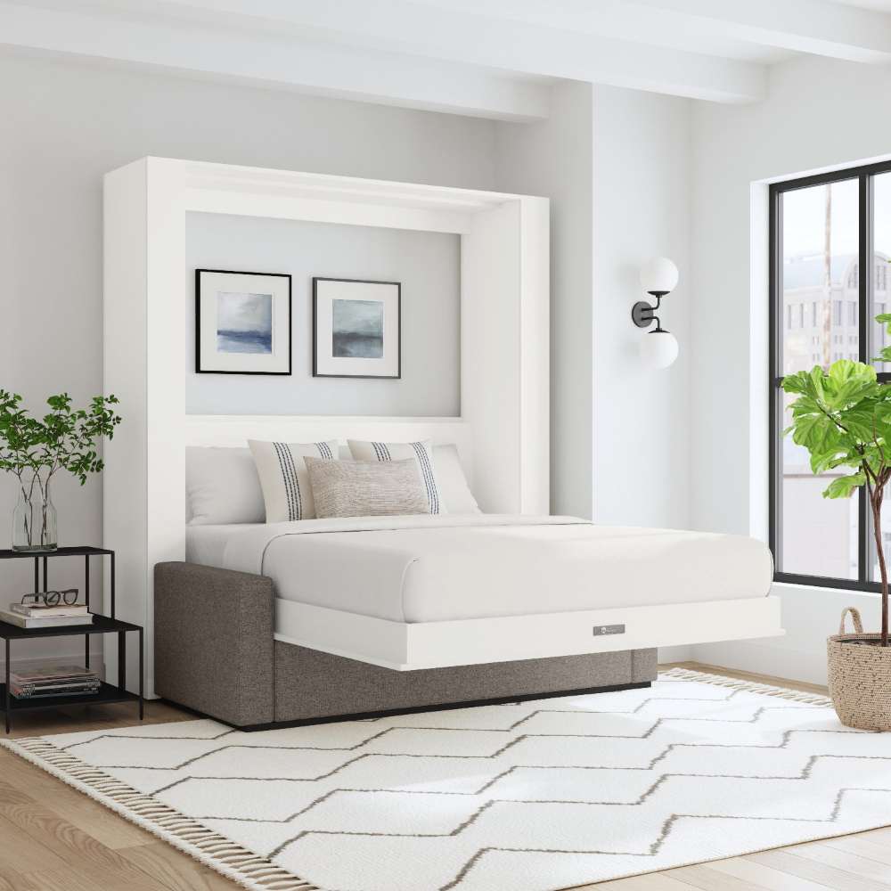 White Inovabed Wall Bed with Sofa and Two Nightstands opened in a loft-style room with white bedding, two framed prints above the headboard and a gray sofa base