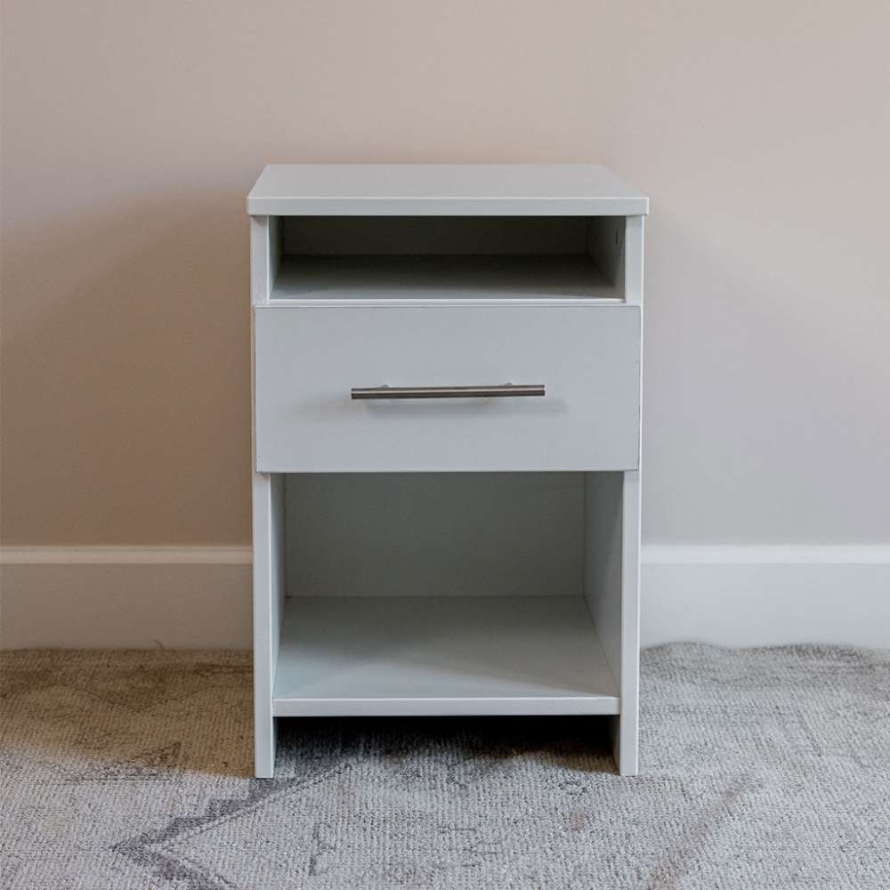 White Inovabed Wall Bed with Sofa and Two Nightstands showing one nightstand head-on against a wall in a carpeted room