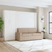 White Inovabed Wall Bed with Sofa and Wide Flex Cabinet closed as a beige sofa in a bright room beside the Wide Flex Cabinet, with a round side table alongside