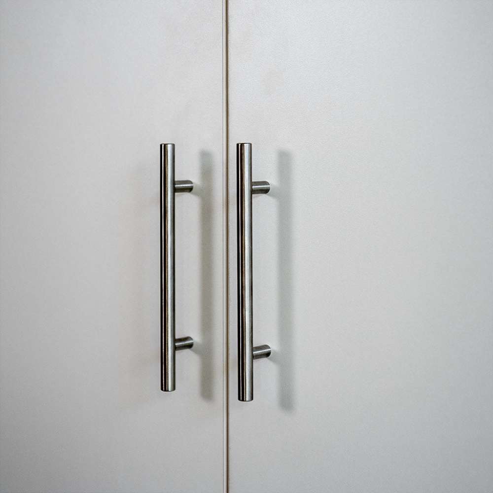 White Inovabed Wall Bed with Sofa and Wide Flex Cabinet in close-up on the two Wide Flex Cabinet door fronts and their slim bar pull handles