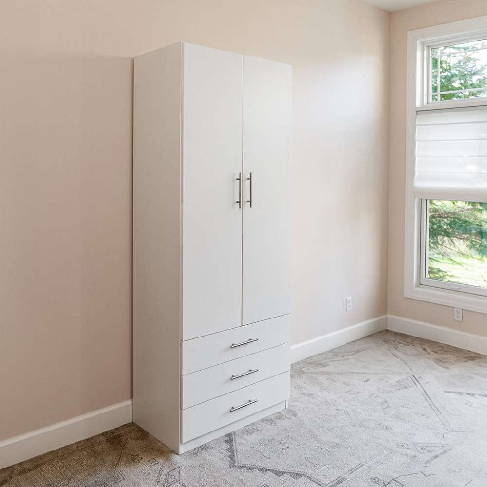 White Inovabed Wall Bed with Sofa and Wide Flex Cabinet showing the Wide Flex Cabinet closed beside a window in a carpeted room