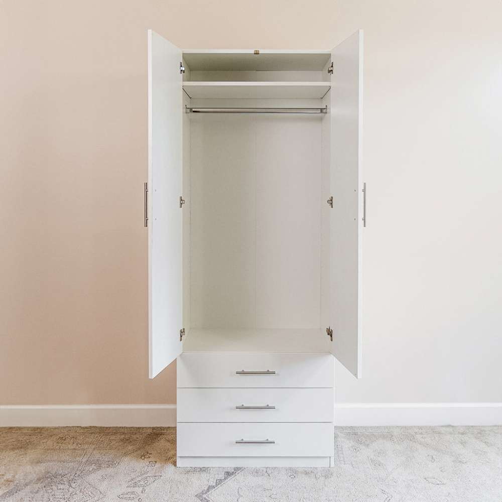 White Inovabed Wall Bed with Sofa and Wide Flex Cabinet showing the Wide Flex Cabinet open head-on in a room, with an empty wardrobe rod and three drawers below