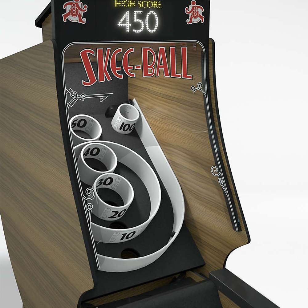 Woodgrain Crate & Barrel Skee-Ball Home Arcade Premium in close up on the backboard showing the red Skee-Ball logo, a high score display reading 450 and the nested scoring rings